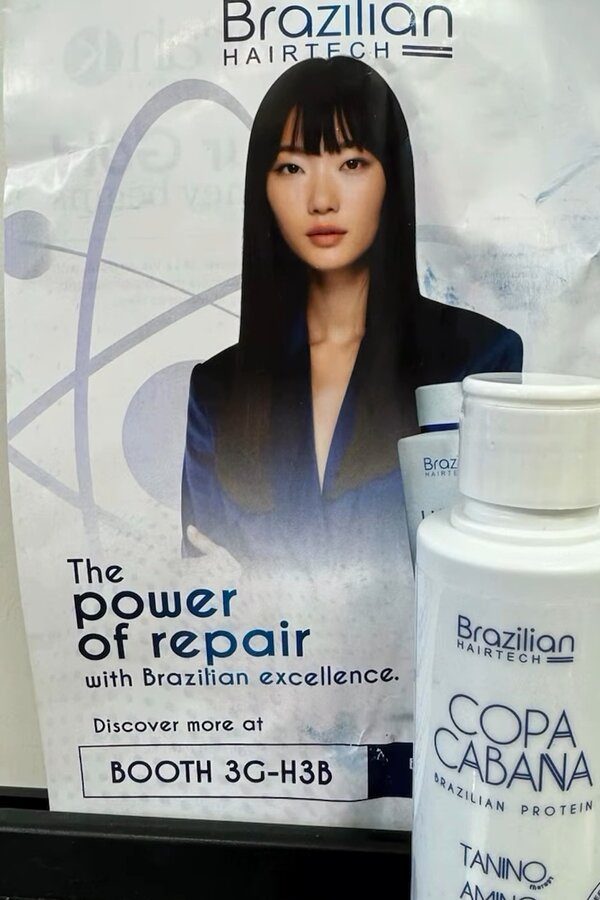 Brazilian Hairtech "power of repair" display banner beside a Copa Cabana Brazilian Protein bottle